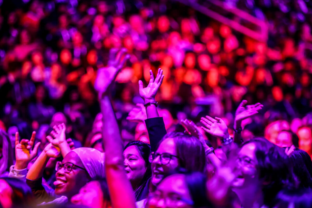 audience-cheering-with-purplered-glow Nightlife